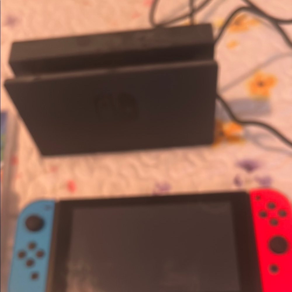 Nintendo Switch with Red and Blue Joy-Con